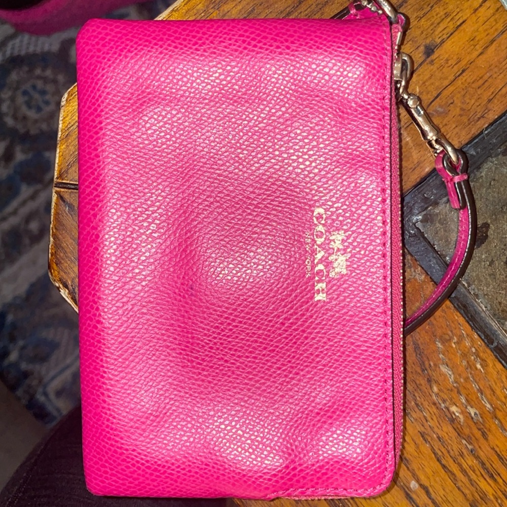 Pink coach wristlet